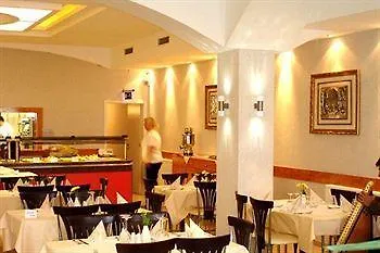 מלון Airport Global Hotel, Olive